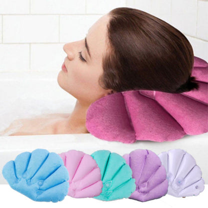 Inflatable bath pillow with suction cup