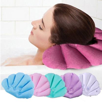 Inflatable bath pillow with suction cup